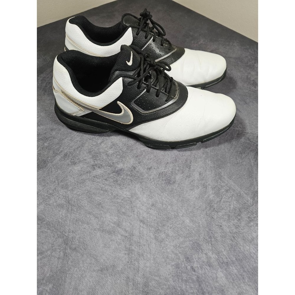 black and gold nike golf shoes